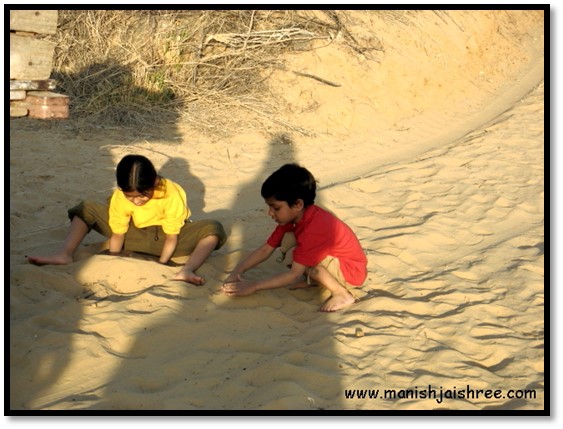 Kids playing in sand